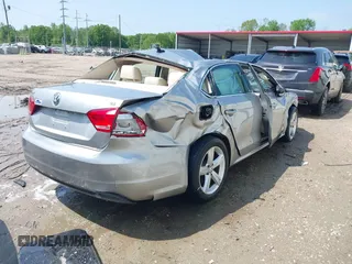 2013 Volkswagen Passat SE w/Sunroof with VIN 1VWBH7A39DC071878, listed as a IAAI auction lot 41903291 with 107,096 mi miles. Bid and sale history available at carsss.com. Image 4.