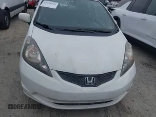 2013 Honda Fit with VIN JHMGE8H30DC067178, listed as a IAAI auction lot 41498926 with 121,036 mi miles. Bid and sale history available at carsss.com. Image 12.