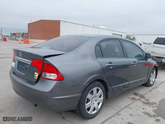 2010 Honda Civic Sdn LX with VIN 2HGFA1F59AH326975, listed as a IAAI auction lot 41953281 with 214,910 mi miles. Bid and sale history available at carsss.com. Image 4.