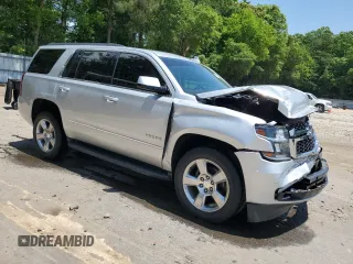 2017 Chevrolet Tahoe LS with VIN 1GNSCAKC4HR403104, listed as a Copart auction lot 57823865 with 185,407 mi miles and Salvage title. Bid and sale history available at DreamBid. Image 4.