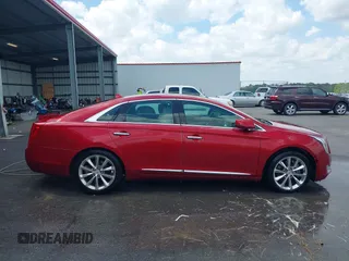 2013 Cadillac XTS Premium with VIN 2G61S5S34D9237236, listed as a IAAI auction lot 41994164 with 218,719 mi miles. Bid and sale history available at carsss.com. Image 13.