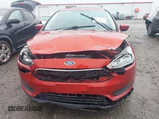 2018 Ford Focus SE with VIN 1FADP3F25JL265039, listed as a IAAI auction lot 42352050 with 140,127 mi miles and . Bid and sale history available at DreamBid. Image 12.