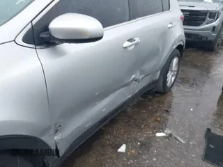 2018 Kia Sportage LX with VIN KNDPM3AC7J7337951, listed as a IAAI auction lot 41900482 with 105,857 mi miles and . Bid and sale history available at carsss.com. Image 6.