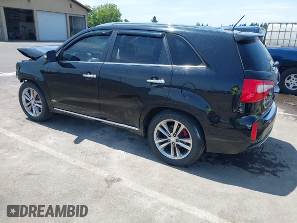 2014 Kia Sorento SX Limited with VIN 5XYKWDA71EG486958, listed as a IAAI auction lot 42483774 with 195,198 mi miles and . Bid and sale history available at DreamBid. Image 3.