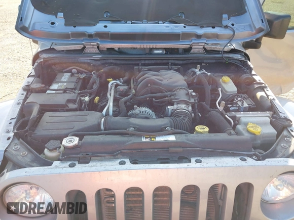 2016 Jeep Wrangler Sahara z VIN 1C4AJWBGXGL120329, wystawiony jako IAAI lot #40239916 z przebiegiem 96 731 mil mil oraz . Historia ofert i sprzedaży dostępna na DreamBid. Obrazek 10.