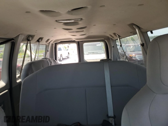 2009 Ford Econoline Passenger XL with VIN 1FBNE31L59DA62487, listed as a Copart auction lot 58073325 with 122,664 mi miles and Salvage title. Bid and sale history available at DreamBid. Image 10.
