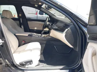 2015 BMW 5 Series 550i with VIN WBAKN9C5XFD961631, listed as a IAAI auction lot 42248127 with 30,821 mi miles and . Bid and sale history available at DreamBid. Image 5.