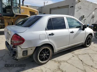 2010 Nissan Versa 1.6 with VIN 3N1CC1AP4AL372566, listed as a Copart auction lot 84704534 with 333,475 mi miles and Salvage Title. Bid and sale history available at carsss.com. Image 3.
