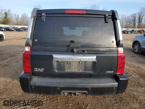 2010 Jeep Commander Limited with VIN 1J4RG5GT6AC113462, listed as a Copart auction lot 82400044 with 189,168 mi miles and Salvage title. Bid and sale history available at DreamBid. Image 6.