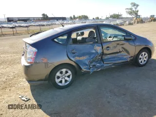 2007 Toyota Prius z VIN JTDKB20U573288978, wystawiony jako Copart lot #57469155 z przebiegiem 170 422 mil mil oraz Szkoda całkowita • Salvage title. Historia ofert i sprzedaży dostępna na DreamBid. Obrazek 3.