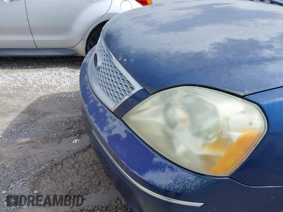 2005 Ford Five Hundred Limited z VIN 1FAHP28165G152683, wystawiony jako IAAI lot #41645455 z przebiegiem 88 622 mil mil oraz . Historia ofert i sprzedaży dostępna na DreamBid. Obrazek 6.
