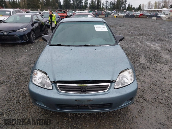 2000 Honda Civic LX with VIN 1HGEJ6677YL000793, listed as a IAAI auction lot 41889317 with 184,766 mi miles. Bid and sale history available at carsss.com. Image 13.