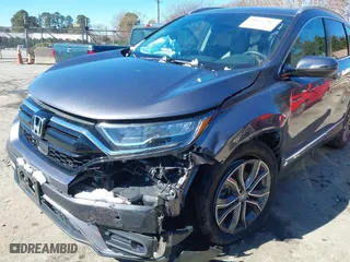 2021 Honda CR-V Touring with VIN 7FARW2H9XME012480, listed as a IAAI auction lot 41632487 with 59,684 mi miles. Bid and sale history available at carsss.com. Image 6.