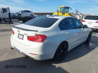 2013 BMW 3 Series 335i with VIN WBA3A9G52DNP36184, listed as a IAAI auction lot 42330629 with 120,377 mi miles and . Bid and sale history available at DreamBid. Image 4.