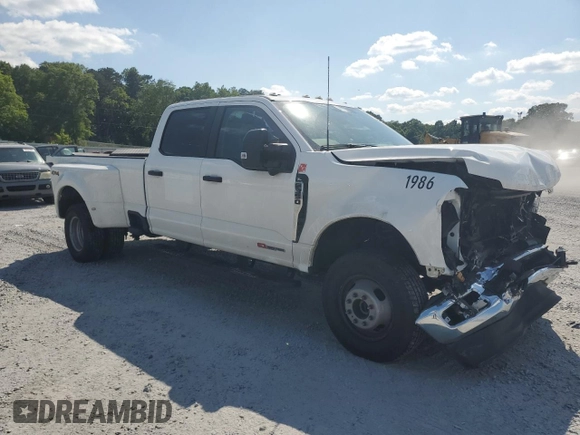 2023 Ford F-350 XL with VIN 1FT8W3DM3PEC71986, listed as a Copart auction lot 55861654 with 14,969 mi miles and Salvage Title. Bid and sale history available at DreamBid. Image 4.
