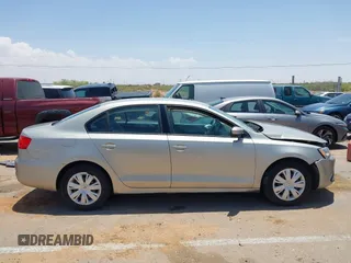 2014 Volkswagen Jetta SE with VIN 3VWD17AJ2EM314622, listed as a IAAI auction lot 42358394 with 105,654 mi miles and . Bid and sale history available at DreamBid. Image 13.