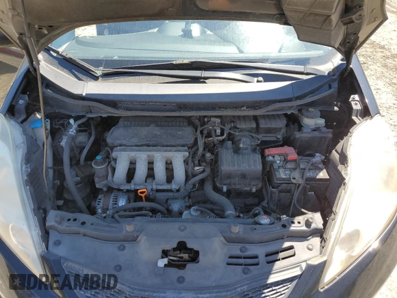 2011 Honda Fit Sport with VIN JHMGE8H57BC024827, listed as a Copart auction lot 59704194 with 146,316 mi miles and Salvage Title. Bid and sale history available at DreamBid. Image 12.