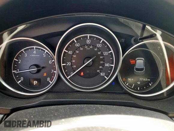 2018 Mazda CX-5 Grand Touring with VIN JM3KFADM8J0451535, listed as a Copart auction lot 59990435 with 77,163 mi miles and Salvage title. Bid and sale history available at DreamBid. Image 9.