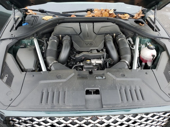 2022 Genesis GV70 3.5T Sport with VIN KMUMCDTC3NU016907, listed as a Copart auction lot 70568194 with 21,645 mi miles and Salvage Title. Bid and sale history available at carsss.com. Image 11.