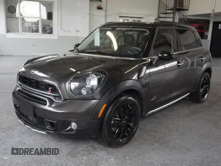 2016 MINI Countryman S with VIN WMWZC5C55GWU00997, listed as a Copart auction lot 58840965 with 41,217 mi miles and Salvage title. Bid and sale history available at DreamBid. Image 2.