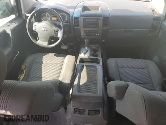 2010 Nissan Titan SE with VIN 1N6BA0ED3AN310467, listed as a Copart auction lot 62888895 with 230,343 mi miles and Salvage title. Bid and sale history available at DreamBid. Image 8.