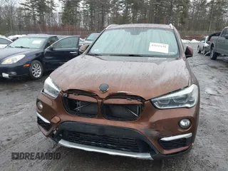 2016 BMW X1 xDrive28i with VIN WBXHT3C31GP881488, listed as a IAAI auction lot 41693116 with 120,922 mi miles. Bid and sale history available at carsss.com. Image 6.
