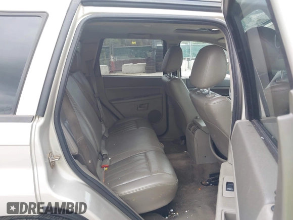 2007 Jeep Grand Cherokee Laredo z VIN 1J8HR48P77C548578, wystawiony jako IAAI lot #41974603 z przebiegiem 179 280 mil mil oraz . Historia ofert i sprzedaży dostępna na DreamBid. Obrazek 8.