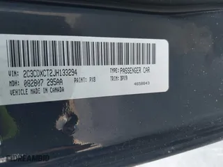 2018 Dodge Charger Daytona with VIN 2C3CDXCT2JH133294, listed as a IAAI auction lot 40938742 with 112,855 mi miles. Bid and sale history available at carsss.com. Image 9.