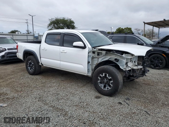 2018 Toyota Tacoma SR z VIN 3TMCZ5AN5JM181489, wystawiony jako Copart lot #55696365 z przebiegiem 70 091 mil mil oraz Szkoda całkowita • Salvage title. Historia ofert i sprzedaży dostępna na DreamBid. Obrazek 4.