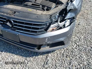 2017 Volkswagen Passat S with VIN 1VWAT7A35HC076253, listed as a IAAI auction lot 42594657 with 121,103 mi miles and . Bid and sale history available at DreamBid. Image 6.