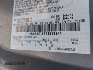 2004 Ford Freestar SE z VIN 2FMZA51614BB12374, wystawiony jako IAAI lot #40813075 z przebiegiem Nie podano mil oraz . Historia ofert i sprzedaży dostępna na DreamBid. Obrazek 9.