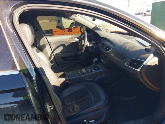 2017 Audi A6 Premium z VIN WAUF8AFC5HN061978, wystawiony jako IAAI lot #41424637 z przebiegiem 168 434 mil mil oraz . Historia ofert i sprzedaży dostępna na DreamBid. Obrazek 5.