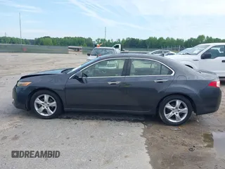 2012 Acura TSX with VIN JH4CU2F45CC016817, listed as a IAAI auction lot 42104700 with 148,617 mi miles. Bid and sale history available at carsss.com. Image 15.