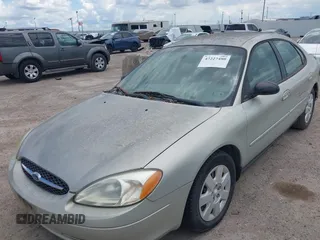 2003 Ford Taurus LX Standard z VIN 1FAFP52U43A149177, wystawiony jako IAAI lot #42227480 z przebiegiem 140 379 mil mil oraz . Historia ofert i sprzedaży dostępna na DreamBid. Obrazek 6.