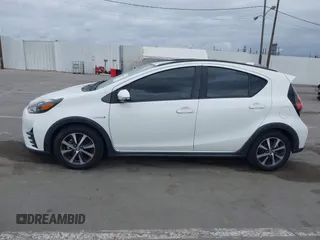 2018 Toyota Prius One with VIN JTDKDTB32J1599677, listed as a IAAI auction lot 42041923 with 83,384 mi miles and . Bid and sale history available at DreamBid. Image 14.