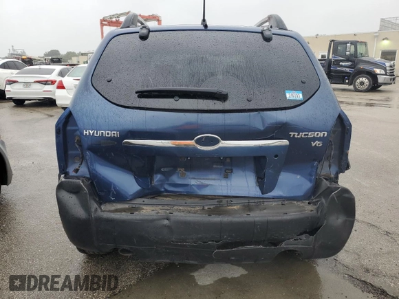 2005 Hyundai Tucson GLS with VIN KM8JN12D05U074879, listed as a Copart auction lot 73746674 with 0 mi miles and Salvage Title. Bid and sale history available at carsss.com. Image 6.