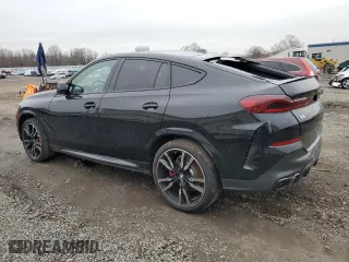 2025 BMW X6 M60i with VIN 5UX43EX02S9W76491, listed as a Copart auction lot 85033264 with 5,173 mi miles and Salvage Title. Bid and sale history available at carsss.com. Image 2.