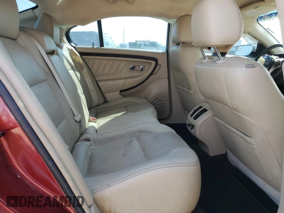 2014 Ford Taurus Limited z VIN 1FAHP2F82EG141034, wystawiony jako Copart lot #52579995 z przebiegiem 207 709 mil mil oraz Szkoda całkowita • Salvage title. Historia ofert i sprzedaży dostępna na DreamBid. Obrazek 11.