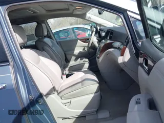 2012 Nissan Quest SL with VIN JN8AE2KP2C9031282, listed as a IAAI auction lot 41868868 with 179,819 mi miles. Bid and sale history available at carsss.com. Image 5.