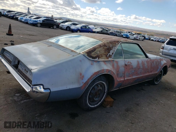 1967 Oldsmobile Toronado with VIN 396877N610043, listed as a Copart auction lot 79516854 with 242,595 mi miles and Clean Title. Bid and sale history available at DreamBid. Image 3.