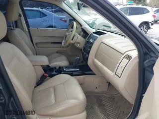 2008 Ford Escape Limited with VIN 1FMCU941X8KB76123, listed as a IAAI auction lot 41990383 with 201,515 mi miles. Bid and sale history available at carsss.com. Image 5.