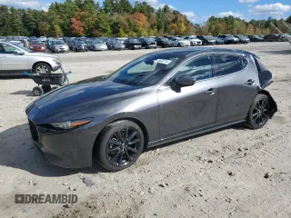 2020 Mazda Mazda3 Hatchback Premium Package with VIN JM1BPBNM7L1155767, listed as a Copart auction lot 75656714 with 57,573 mi miles and Salvage Title. Bid and sale history available at carsss.com. Image 1.