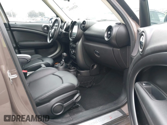 2015 MINI Countryman S z VIN WMWZC3C53FWT02232, wystawiony jako IAAI lot #42204694 z przebiegiem 107 544 mil mil oraz . Historia ofert i sprzedaży dostępna na DreamBid. Obrazek 5.