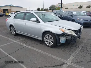 2012 Toyota Avalon with VIN 4T1BK3DB7CU449944, listed as a IAAI auction lot 40809208 with 113,676 mi miles. Bid and sale history available at carsss.com. Image 1.