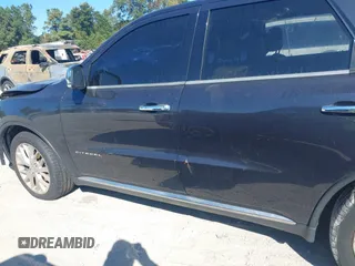 2014 Dodge Durango Citadel with VIN 1C4SDJETXEC390326, listed as a IAAI auction lot 40620779 with 119,537 mi miles and . Bid and sale history available at DreamBid. Image 14.