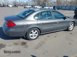 2003 Ford Taurus SE Standard with VIN 1FAFP53U03G240491, listed as a IAAI auction lot 41967252 with 191,151 mi miles. Bid and sale history available at carsss.com. Image 4.