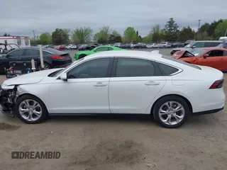 2024 Honda Accord LX z VIN 1HGCY1F20RA058803, wystawiony jako IAAI lot #42059758 z przebiegiem 13 071 mil mil oraz . Historia ofert i sprzedaży dostępna na DreamBid. Obrazek 14.