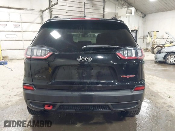 2022 Jeep Cherokee Trailhawk with VIN 1C4PJMBX8ND517236, listed as a IAAI auction lot 41530369 with 34,164 mi miles and . Bid and sale history available at DreamBid. Image 16.