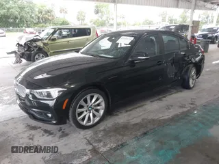 2018 BMW 3 Series 320i with VIN WBA8E1G54JNU90018, listed as a IAAI auction lot 42236134 with 73,589 mi miles and . Bid and sale history available at DreamBid. Image 2.
