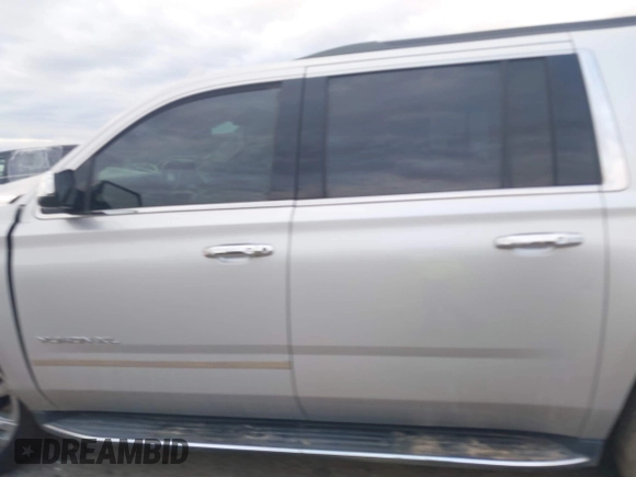 2019 GMC Yukon XL SLT with VIN 1GKS1GKC8KR383694, listed as a IAAI auction lot 41466213 with 128,368 mi miles. Bid and sale history available at carsss.com. Image 14.